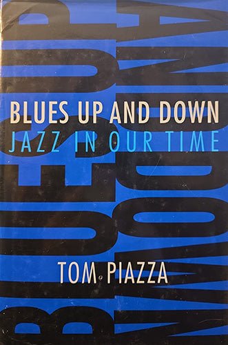 Front cover of Blues Up and Down: Jazz in Our Time by Tom Piazza featuring bold blue and black graphic design.