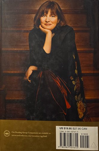 Back dust jacket of Blackbird House showing a portrait of author Alice Hoffman seated on wooden steps, with ISBN and price barcode at the bottom.
