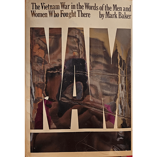 A bold, reflective cover with "NAM" in large block letters, mirroring images of soldiers. The title conveys the stark reality of war.