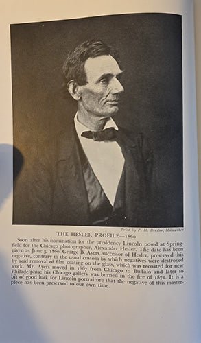 Black and white portrait of Abraham Lincoln on a dark background