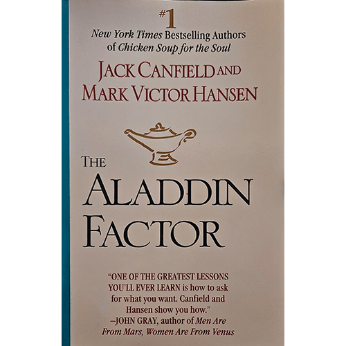 Cover of The Aladdin Factor featuring a mystical lamp emitting a bright glow, symbolizing the power of asking to unlock one's desires and potential.