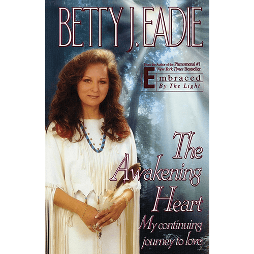 Cover of The Awakening Heart by Betty J. Eadie, featuring the author in white with a peaceful forested background and soft heavenly light.