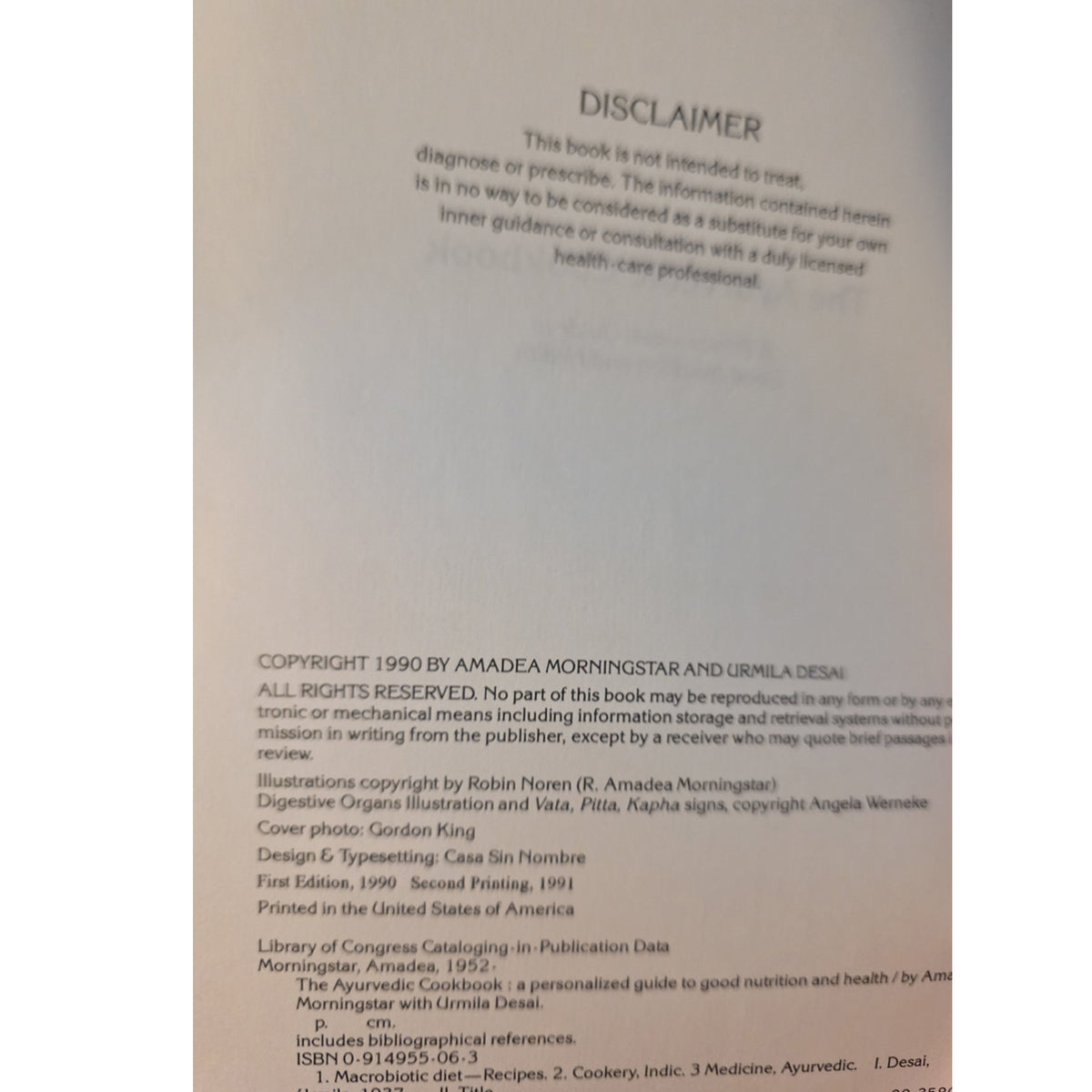 A close-up , showing a disclaimer section at the top and copyright details below in black text on an off-white background.
