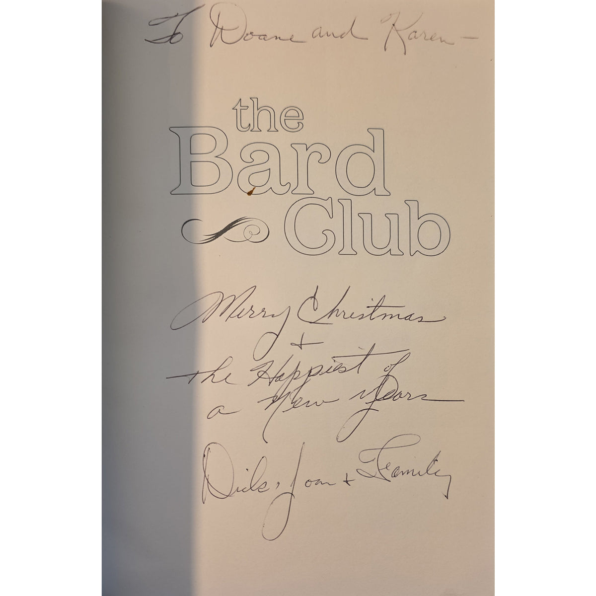 A signed vintage paper program or poster for 'The Bard Club' featuring cursive autographs, including 'To Doane and Karen' and 'Merry Christmas to the Departed of a New Year.'.
