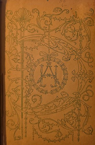 An ornate vintage-style monogram illustration featuring an A enclosed in a wreath, surrounded by elaborate scrolling floral and vine motifs, printed in dark green on a warm tan paper background.