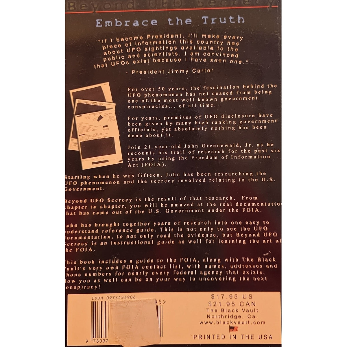 The back cover of the book 'Embrace the Truth' by The Black Vault, featuring a dark brown background with white text, a small black-and-white illustration of a book and a globe, and a gold-colored barcode band at the bottom.