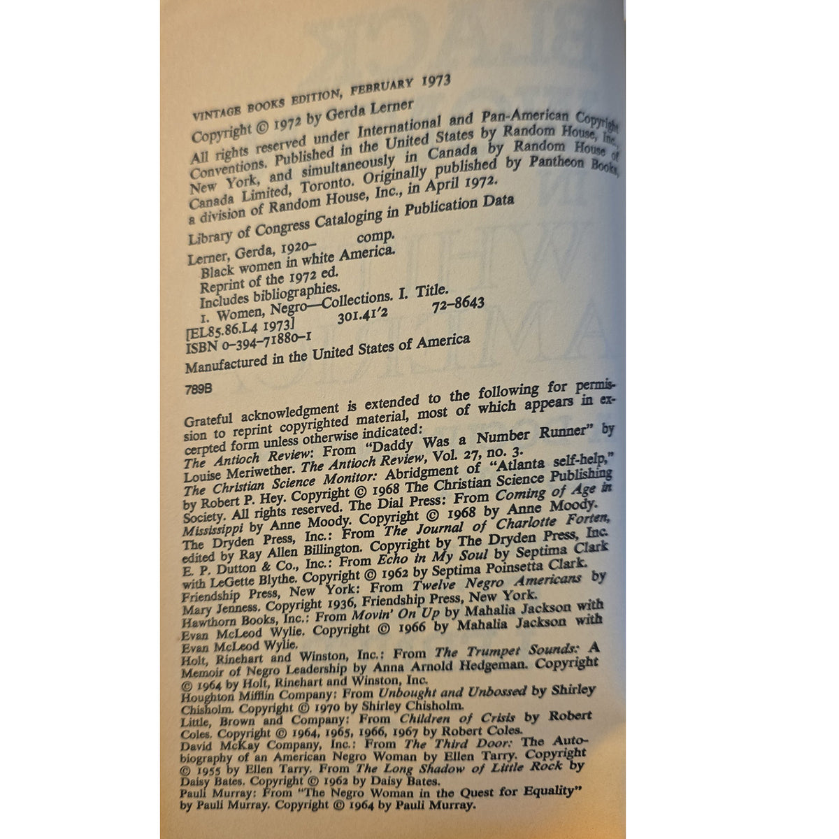 book, showing publication details, copyright text, and a list of contributors in small black print on a white background.