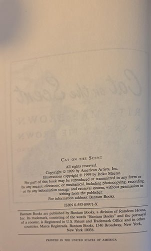 Copyright page of Cat on the Scent by Rita Mae Brown and Sneaky Pie Brown, published by Bantam Books, 1999.