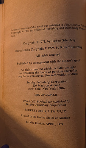 A close-up of a vintage book's copyright page, showing printed text on aged tan paper. Visible text includes copyright details for Robert Silverberg and Berkley Publishing Corporation.