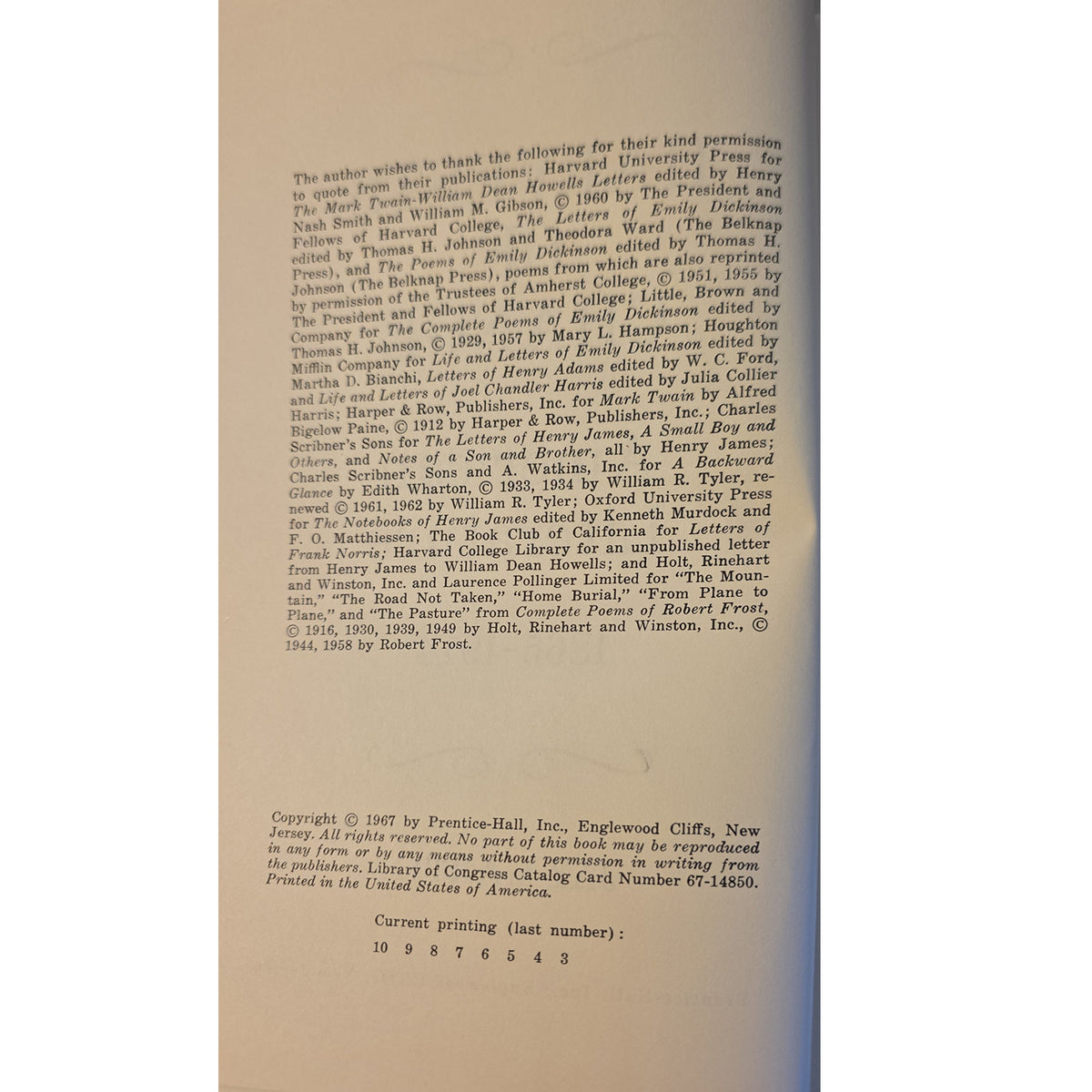 A photographed interior page of a printed book or publication, showing black text on an off-white page with a curved fold line near the top.