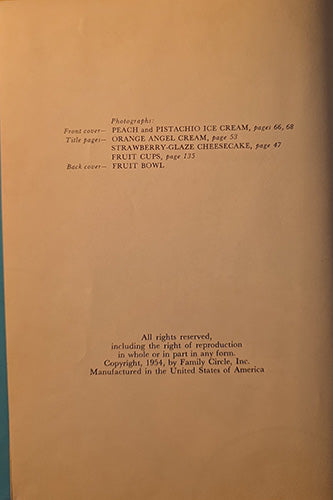 A vintage book page showing printed photographs and copyright text on a tan paper background, with a blue-green edge visible along the left side.