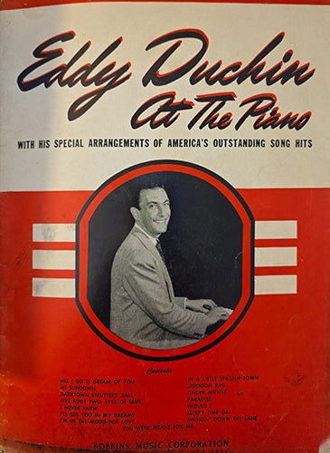 Front cover of 1930s sheet music “Eddy Duchin at the Piano” showing photographic portrait of pianist Eddy Duchin with bold graphic design