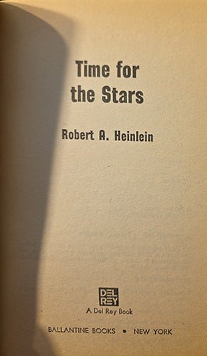 The front cover of the book 'Time for the Stars' by Robert A. Heinlein, published by Ballantine Books.