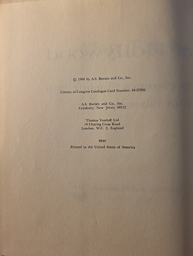 A close-up of a book's printed title page showing copyright text for A.S.