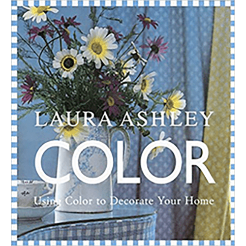 Cover of Laura Ashley Color featuring a blue and white checkered border, wildflowers in a vase, and home textiles in soft hues of yellow and blue.