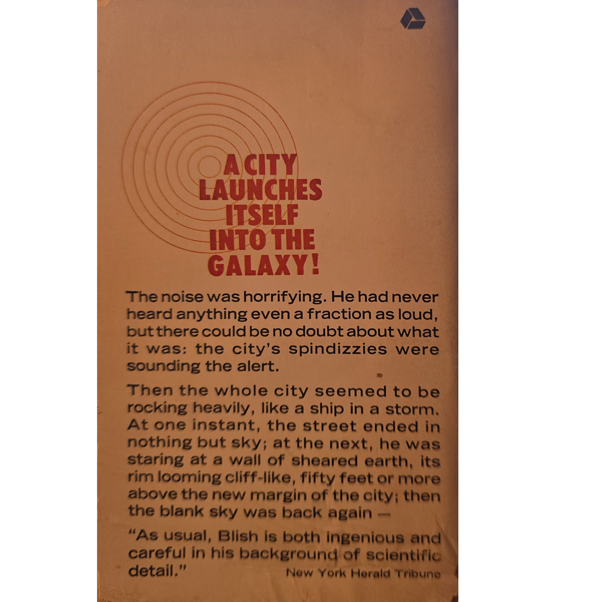 The back cover of a sci-fi book titled 'A City Launches Itself Into the Galaxy!' featuring a brown background with red and black text and a small triangular logo in the top right corner.