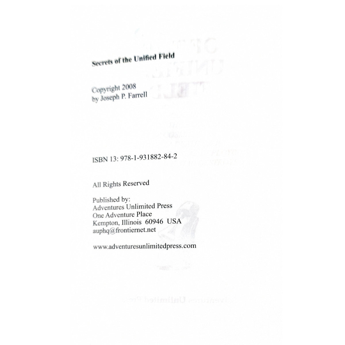A white page with black printed text reading 'Secrets of the Unified Field' and copyright information for Joseph P. Farrell, including ISBN 13: 978-1-931882-84-2 and publisher details for Adventures Unlimited Press.