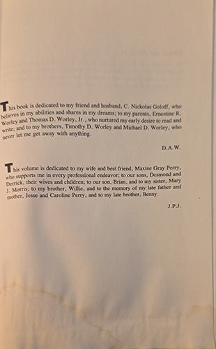 Lower page margins showing water staining and rippling that does not affect the readability of the text.