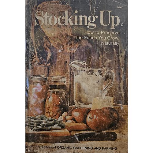 Cover of Stocking Up: How to Preserve the Foods You Grow, Naturally shows jars of preserved vegetables, cheese, milk, and fresh produce, emphasizing the theme of food preservation.