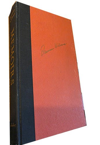 Front cover of Memoirs by Tennessee Williams showing original publisher’s half black cloth spine and rust-colored patterned boards with gilt lettering.