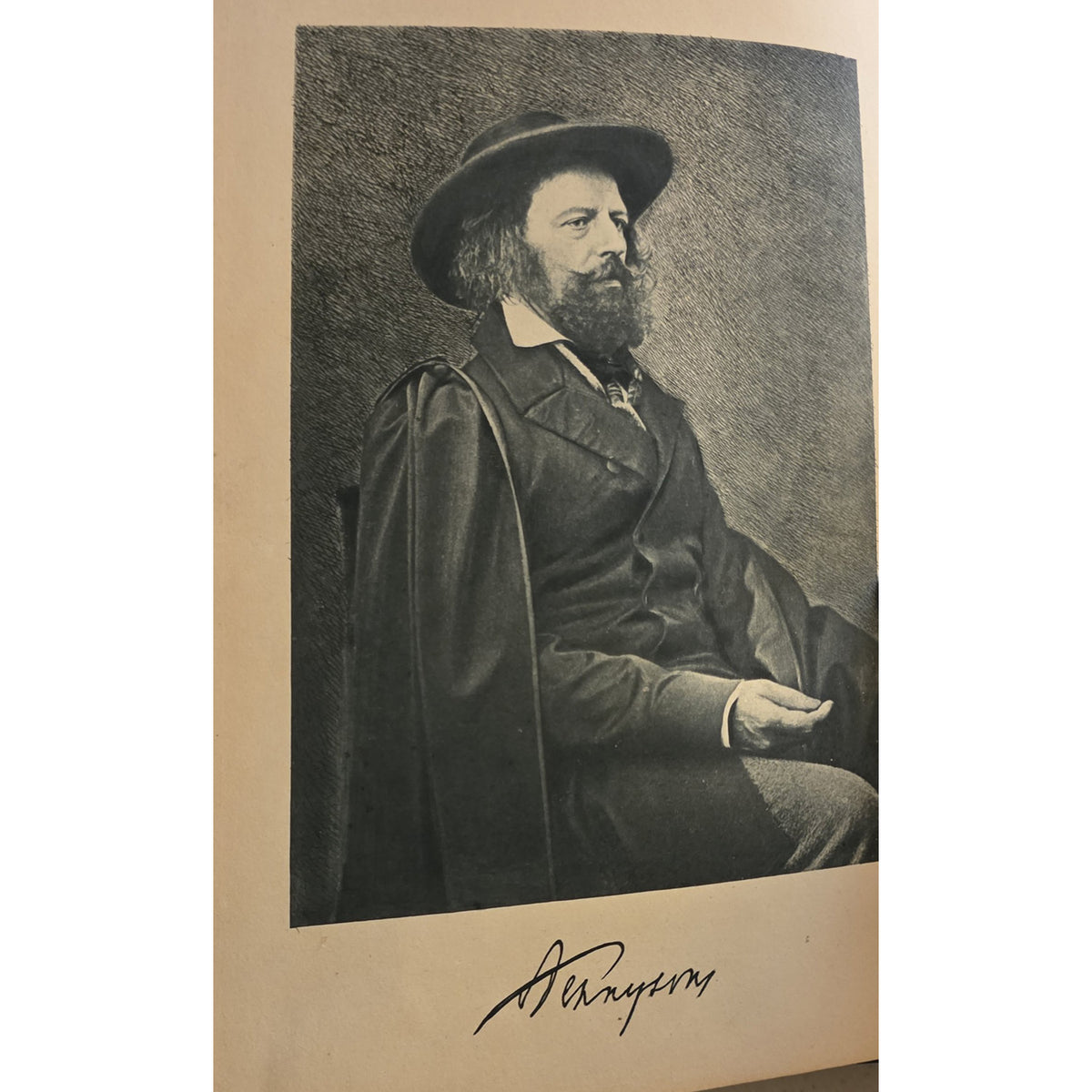 A vintage black-and-white portrait print of a bearded man wearing a wide-brimmed hat and dark coat, mounted on a beige paper border with an artist's signature at the bottom.