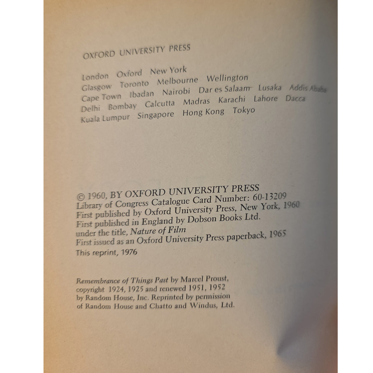 Copyright page identifying the 1976 Oxford University Press paperback reprint of Theory of Film.
