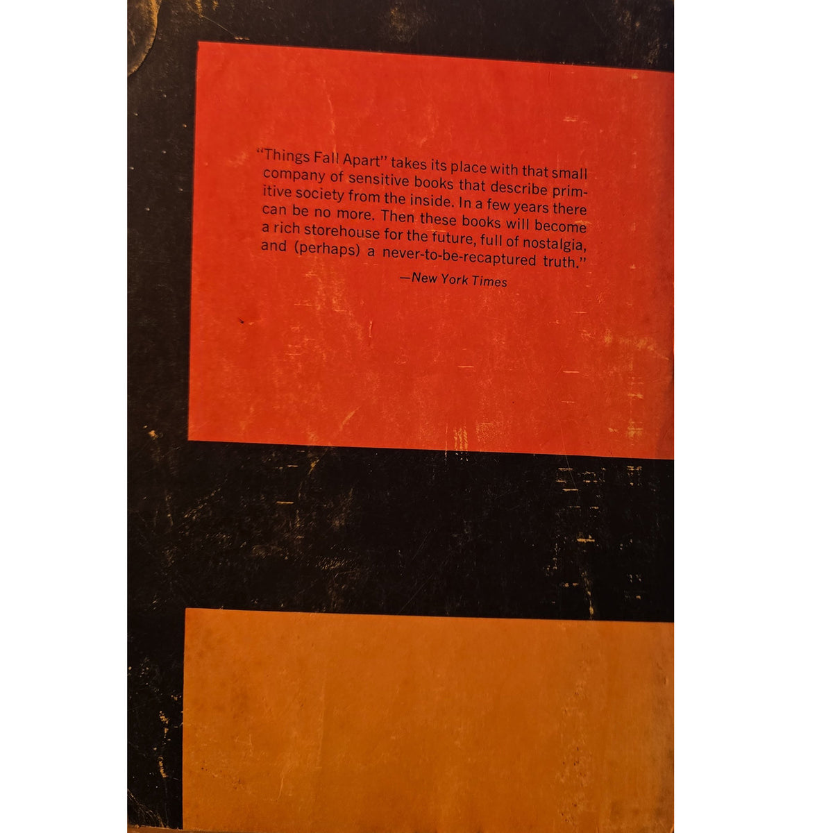 Back cover of Things Fall Apart featuring a contemporary review.