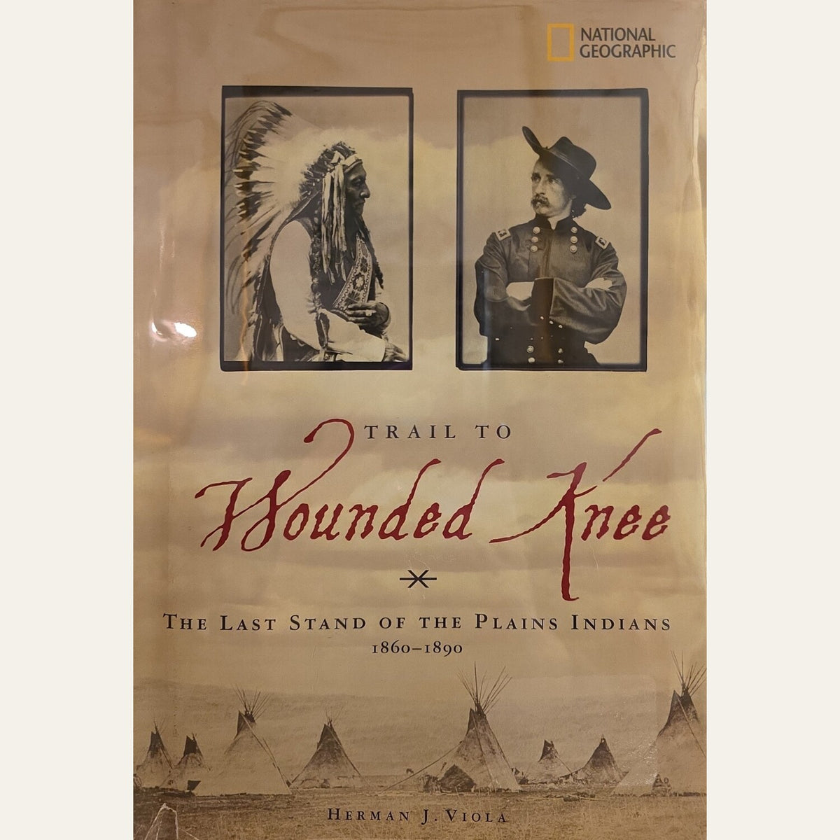 National Geographic book cover for 'Trail to Wounded Knee: The Last Stand of the Plains Indians 1860-1890' by Herman J. Viola, featuring sepia-toned portraits and teepees.