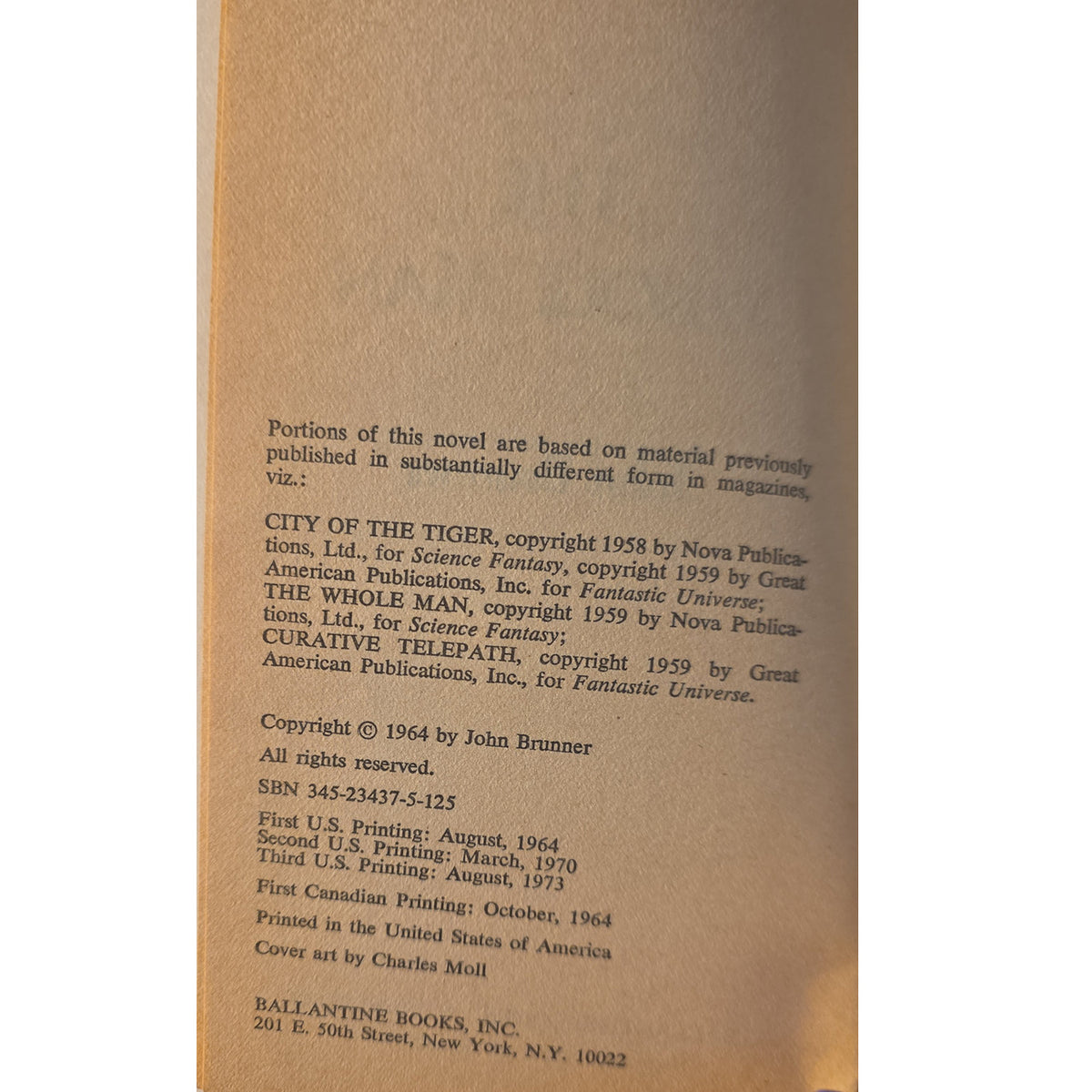 A close-up of a vintage book's copyright page printed on tan paper, showing text for 'City of the Tiger' and copyright details for Nova Publications and Ballantyne Books.