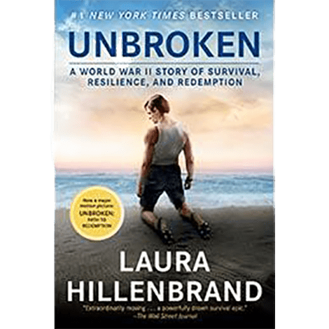 The cover features an image of a lone figure standing against a vast beach, symbolizing Louis Zamperini's resilience during his wartime struggle for survival.