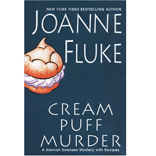 Cover of Cream Puff Murder by Joanne Fluke featuring a stylized cream puff illustration and bold title in white against a deep blue background.