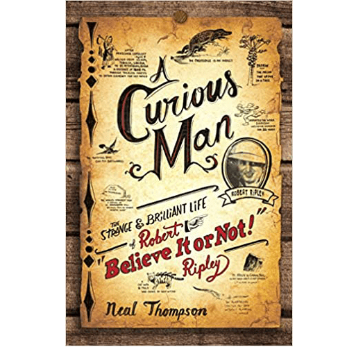 Cover of 'A Curious Man: The Strange and Brilliant Life of Robert "Believe It or Not!" Ripley' by Neal Thompson. The cover has an aged parchment design with drawings of oddities and curiosities. The title is in bold, vintage-style lettering, with a circular portrait of Robert Ripley and his signature. The author's name is at the bottom