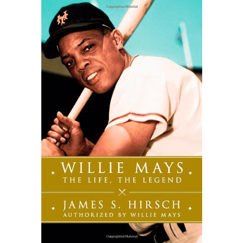 The cover of Willie Mays: The Life, The Legend features a smiling Willie Mays in his baseball uniform holding a bat over his shoulder against a vibrant background, with bold gold and white text.