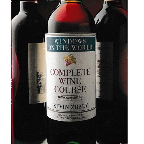 Cover of Windows on the World Complete Wine Course Millennium Edition by Kevin Zraly, featuring wine bottles and a classic wine label design.