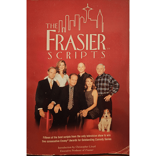 The cover of Frasier Scripts features a minimalist design with the title in bold white text against a deep navy background, complemented by the iconic Seattle skyline and a subtle silhouette of a microphone.