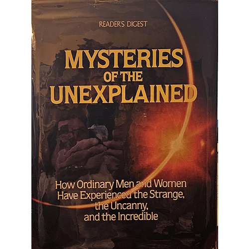 Dark cover featuring a partial solar eclipse with glowing orange and yellow hues, clouds, and the title "Mysteries of the Unexplained" in bold yellow font. Subtitle below highlights uncanny experiences.