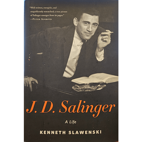 Please provide an alt des of the cover ChatGPT The cover of "J.D. Salinger: A Life" by Kenneth Slawenski features a black-and-white photograph of J.D. Salinger. Salinger is shown in a close-up, three-quarter profile, looking off to the side with a contemplative expression. He is dressed in a casual shirt, and his hair is neatly combed. The background is blurred, keeping the focus on Salinger's face. The title of the book is displayed prominently in bold, white letters across the top,