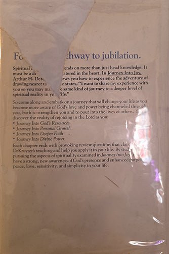 Back cover of Journey into Joy with description and jacket wear noted