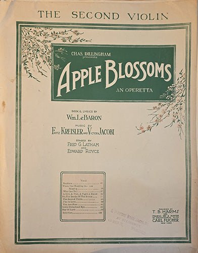 Sheet music cover for 'Apple Blossoms' operetta with decorative elements and text.