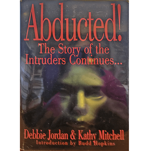 The cover of "Abducted! The Story of the Intruders Continues..." features a haunting, abstract image of a face with dark shadows, conveying the eerie and mysterious theme of alien abduction.