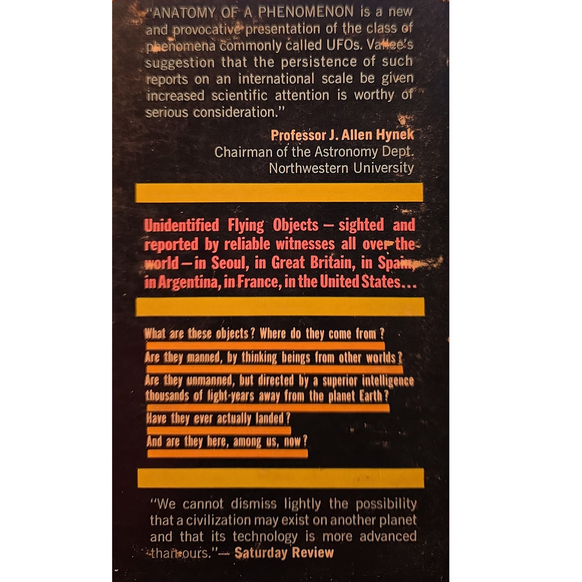 The back cover of the book 'Anatomy of a Phenomenon' by Professor J. Allen Hynnek, featuring a dark brown textured background with white and red text blocks separated by yellow horizontal lines.