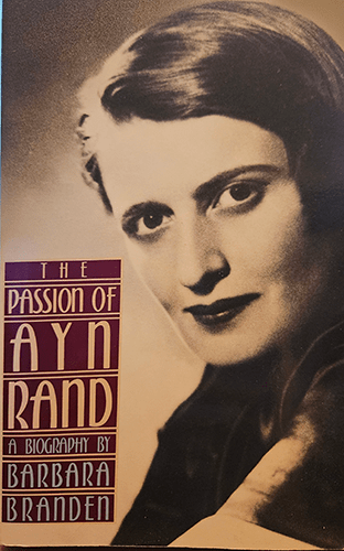 The book cover for "The Passion of Ayn Rand: A Biography" features a portrait of Ayn Rand, capturing her intense gaze and determined expression. The background is a muted color, drawing focus to Rand's face, with the title and author's name prominently displayed above and below the portrait.