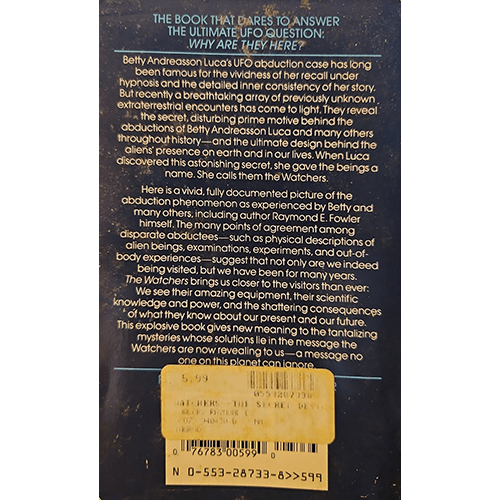 Back cover of a book with text and a barcode on a dark background