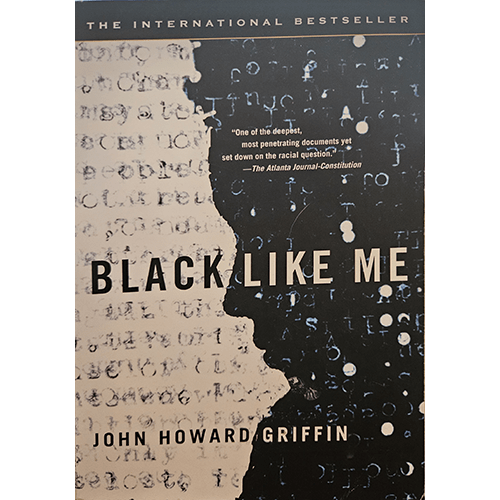 Cover of Black Like Me by John Howard Griffin, featuring a black-and-white image with text partially obscured on one side. The title appears prominently in bold black letters across the middle.