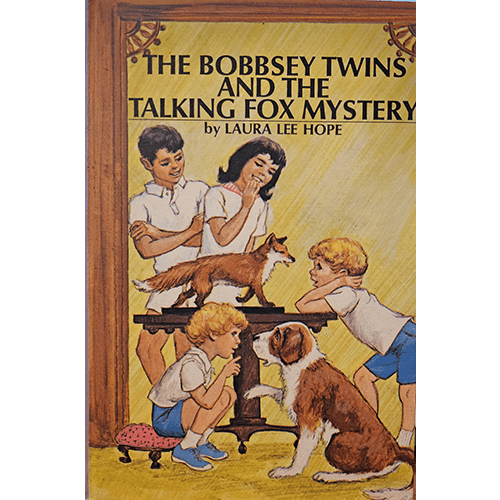 The cover features the Bobbsey Twins gathered around a table, excitedly engaging with a lively fox and their loyal dog. The colorful, vintage illustration captures the charm of this children's mystery.