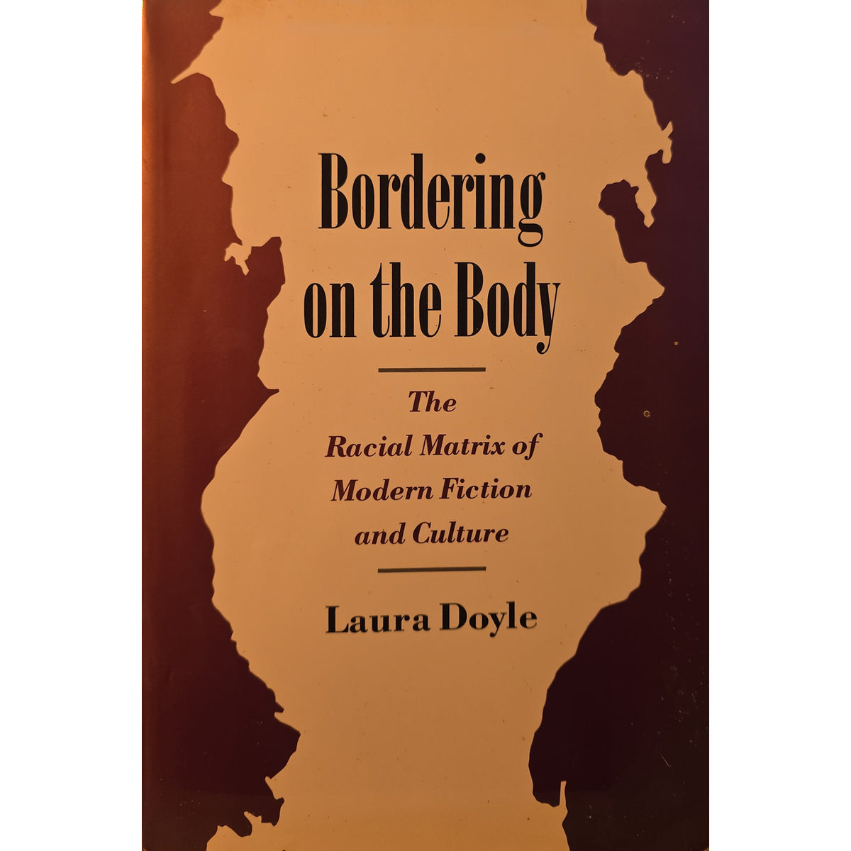 Book cover of 'Bordering on the Body: The Racial Matrix of Modern Fiction and Culture' by Laura Doyle, featuring a tan and dark brown map-like silhouette design with black text.