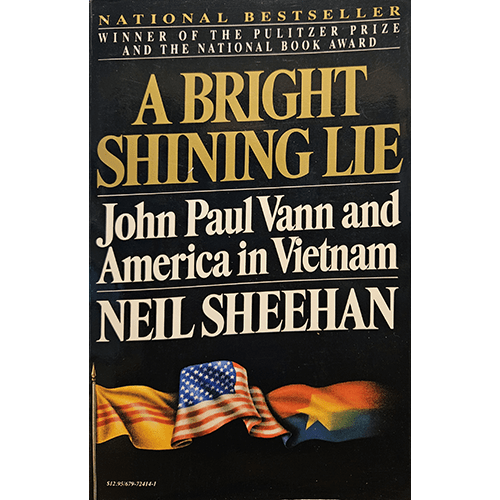 Cover of A Bright Shining Lie: John Paul Vann and America in Vietnam by Neil Sheehan, featuring the U.S. and Vietnam flags intertwined against a black background with gold and white title text.