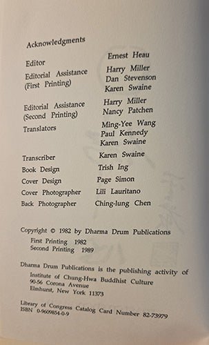 A printed page with acknowledgments and copyright text for Dharma Drum Publications, photographed against a light gray background.