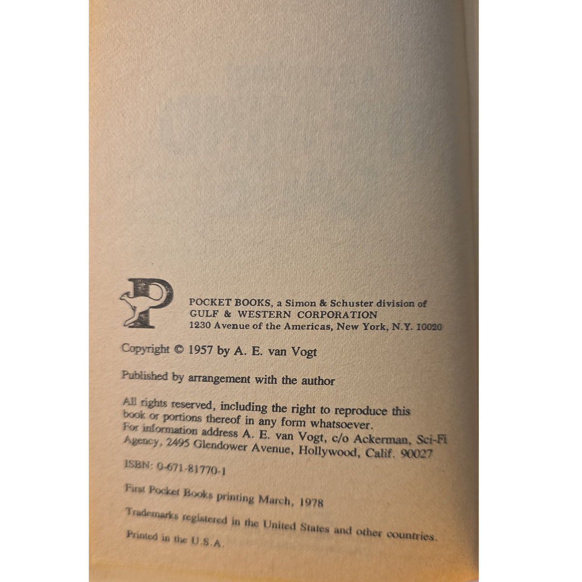 A close-up of a book's copyright page printed on warm beige paper, showing publisher and publication details including Pocket Books, Simon & Schuster, and A. E.