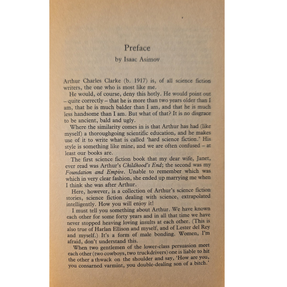 A scanned book page with a tan paper background and black printed text, headed 'Preface' and 'By Isaac Asimov,' showing the interior preface of a science fiction book.